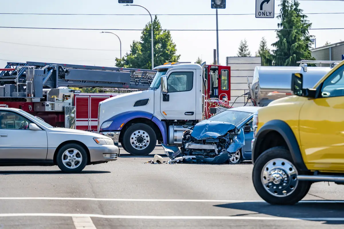 car and a big rig semi truck accident